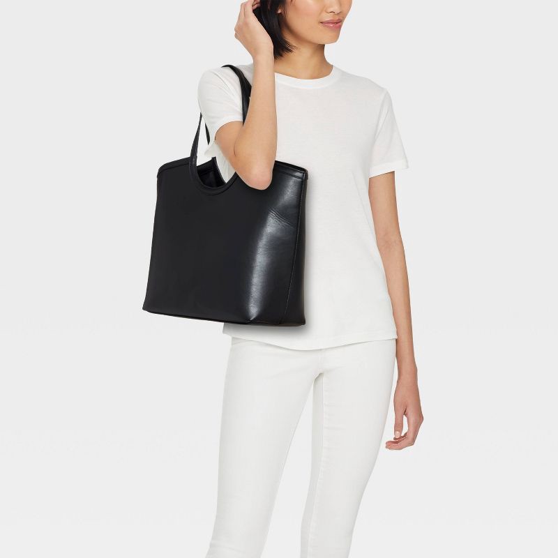 slide 2 of 5, XL Cut Out Tote Handbag - A New Day™ Black, 1 ct