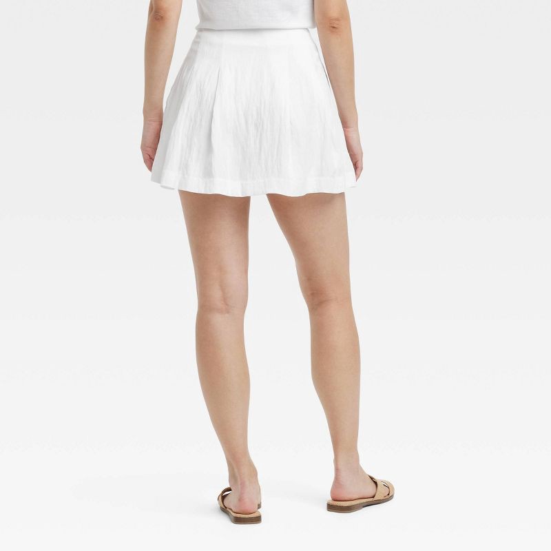 slide 2 of 4, Women's High-Rise Pleated Skort - A New Day™ White 12: Lightweight Twill, Side Zipper, Machine Washable, 1 ct