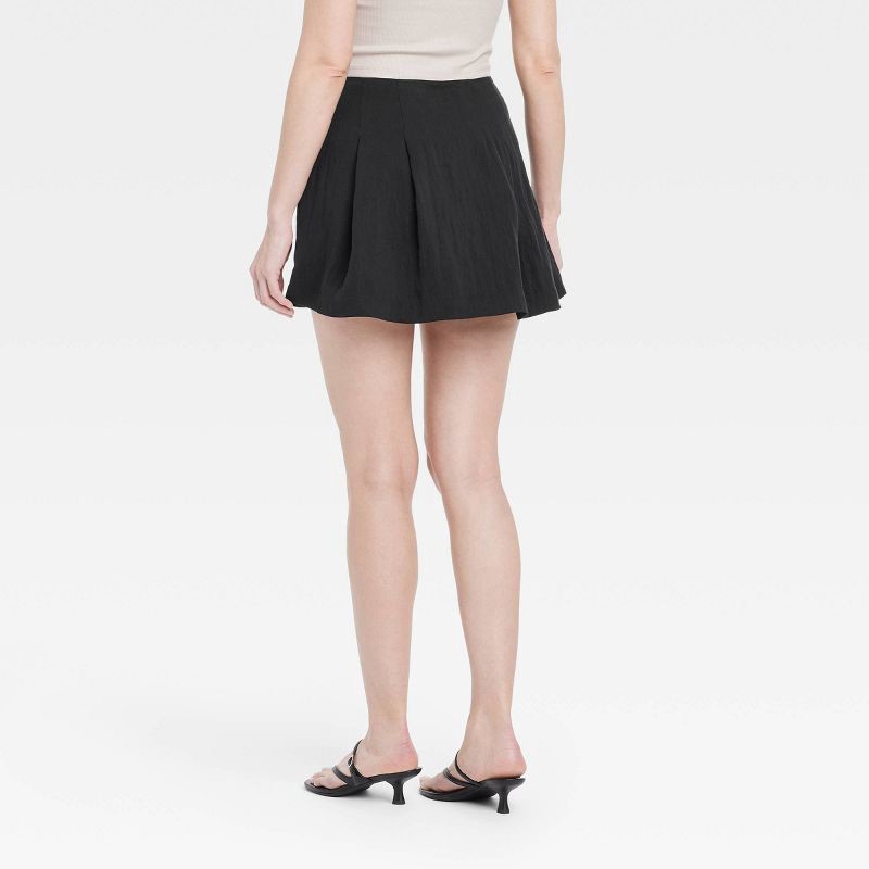 slide 2 of 3, Women's High-Rise Pleated Skort - A New Day™ Black 4: Lightweight Twill, Side Zipper, Above Knee Length, 1 ct