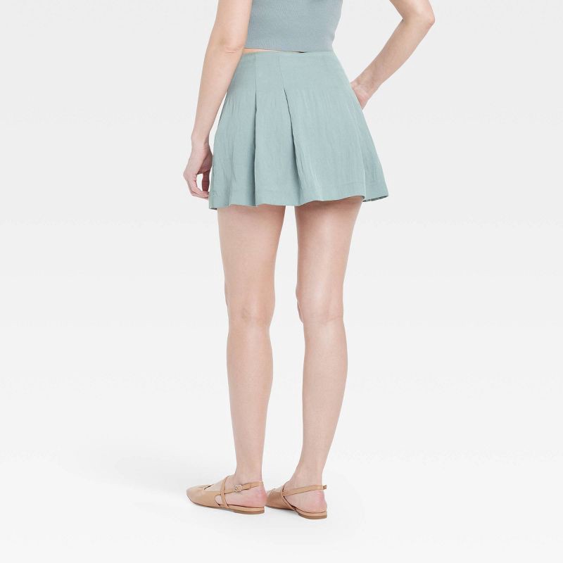 slide 2 of 3, Women's High-Rise Pleated Skort - A New Day™ Teal 14: Lightweight Twill, Side Zipper, Above Knee, 1 ct