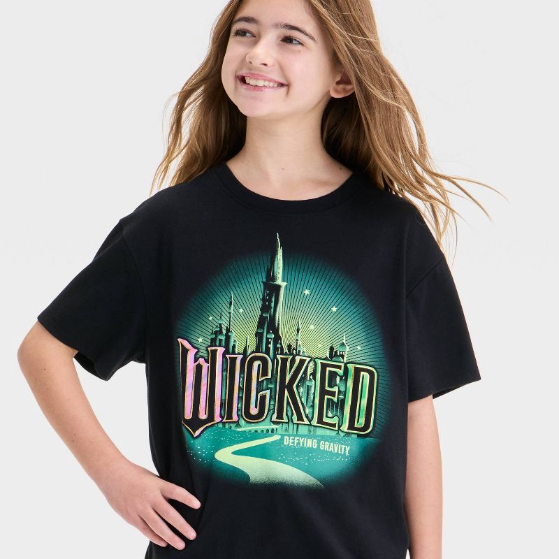 slide 2 of 4, Girls' Wicked Emerald City Oversized Short Sleeve Graphic T-Shirt - Black L, 1 ct