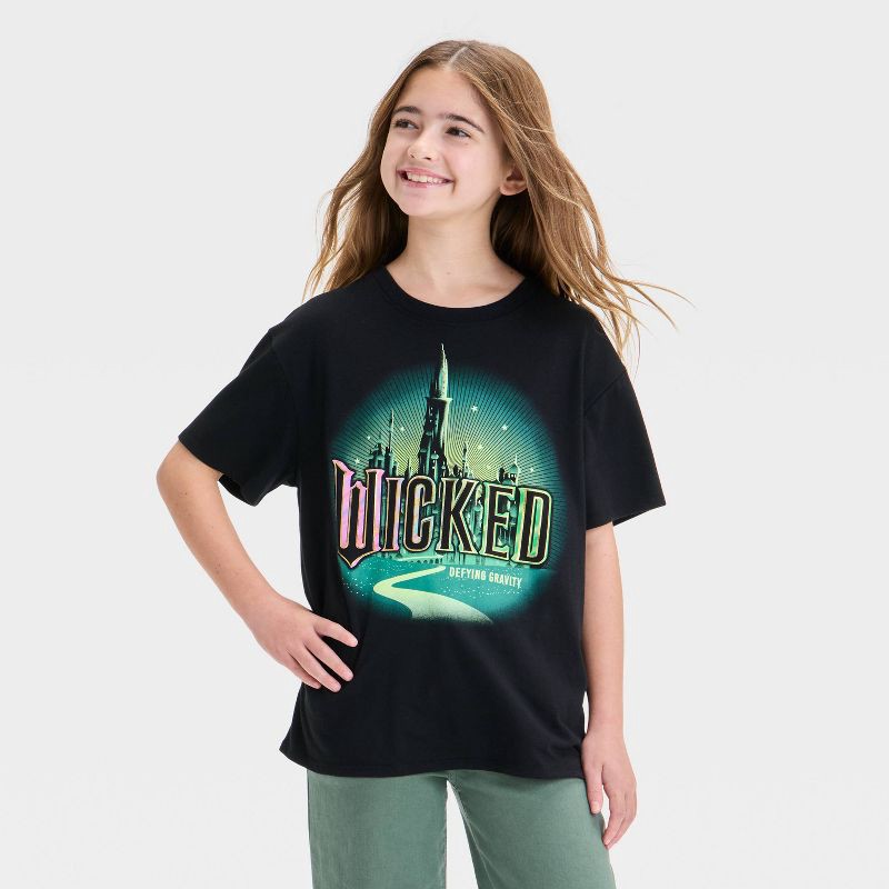 slide 1 of 4, Girls' Wicked Emerald City Oversized Short Sleeve Graphic T-Shirt - Black L, 1 ct