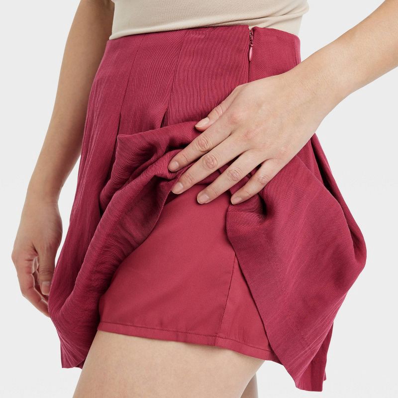 slide 4 of 4, Women's High-Rise Pleated Skort - A New Day™ Burgundy 10: Lightweight Twill, Side Zipper, 1 ct