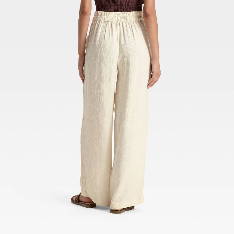 slide 2 of 3, Women's High-Rise Modern Gauze Pull-On Pants - A New Day™ Cream XL, 1 ct