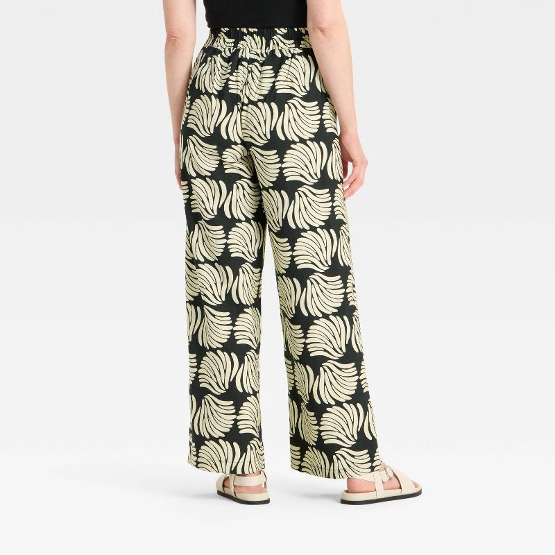 slide 2 of 3, Women's High-Rise Wide Leg Pants - A New Day™ Black Shell M, 1 ct