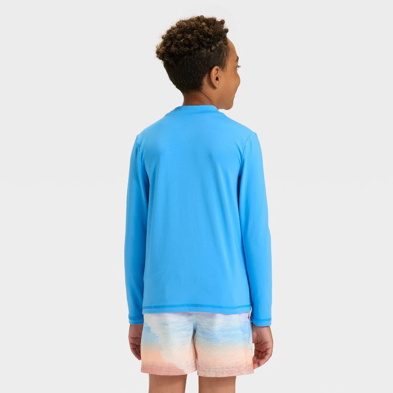 slide 3 of 3, Boys' Solid Long Solid Sleeve Rashguard Top - Cat & Jack™ Blue M, 1 ct