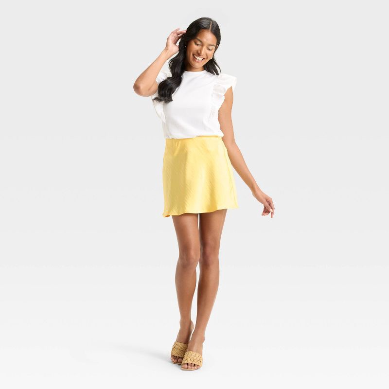 slide 3 of 3, Women's Satin Mini A-Line Skirt - A New Day™ Yellow M, 1 ct