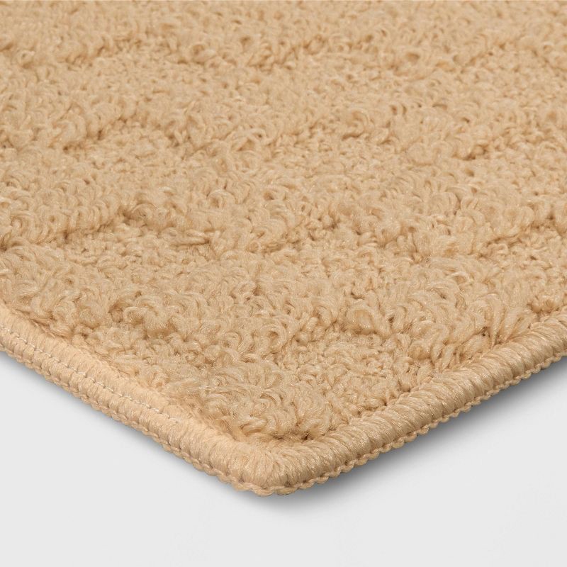 slide 3 of 4, 1'8"x2'6" Tufted Rug Tan - Room Essentials™, 1 ct
