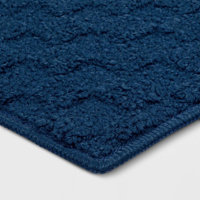 slide 3 of 4, 1'8"x2'6" Tufted Rug Navy - Room Essentials™, 1 ct