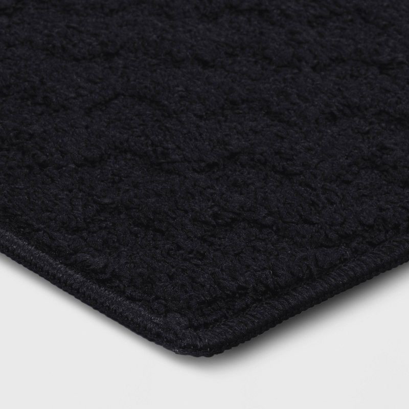 slide 3 of 4, 1'8"x2'6" Tufted Rug Black - Room Essentials™, 1 ct
