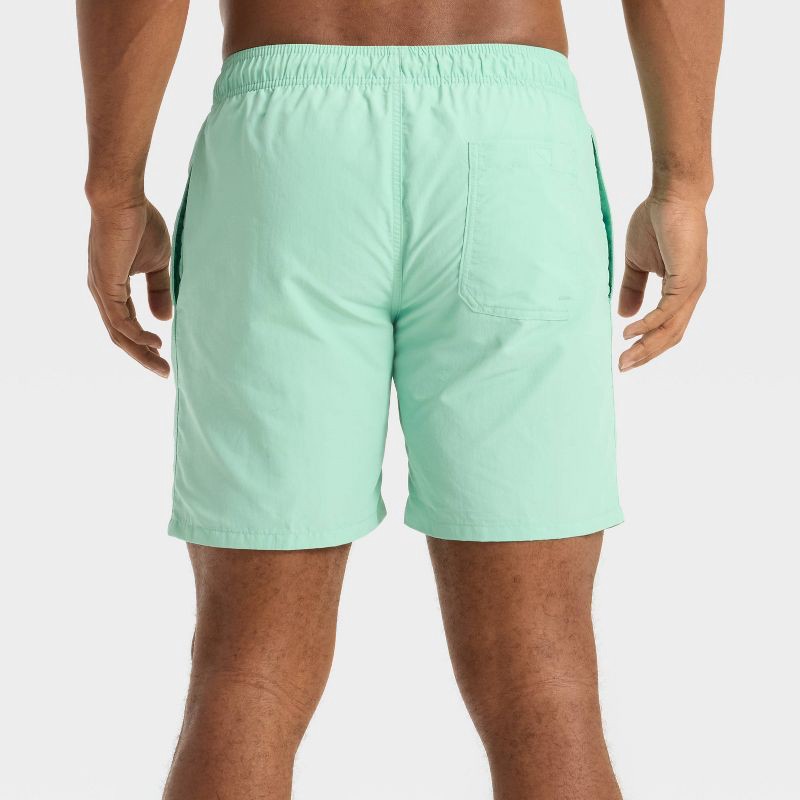 slide 2 of 3, Men's 7" Solid Color Swim Shorts - Goodfellow & Co™ Seafoam Green M, 1 ct