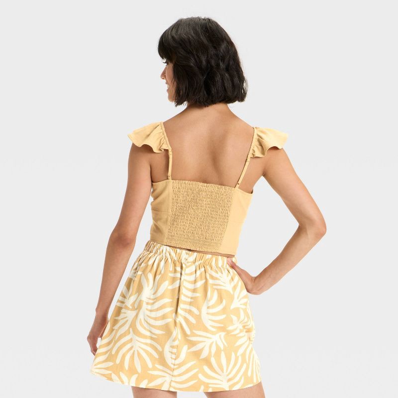 slide 2 of 3, Women's Ruffle Sleeve Woven Halter Top - A New Day™ Tan L, 1 ct