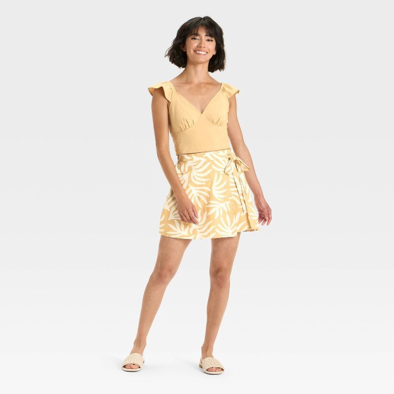 slide 3 of 3, Women's Ruffle Sleeve Woven Halter Top - A New Day™ Tan L, 1 ct