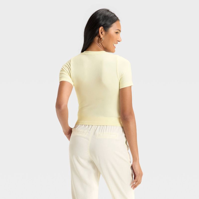 slide 2 of 3, Women's Slim Fit Short Sleeve Seamless Baby T-Shirt - A New Day™ Off-White L, 1 ct