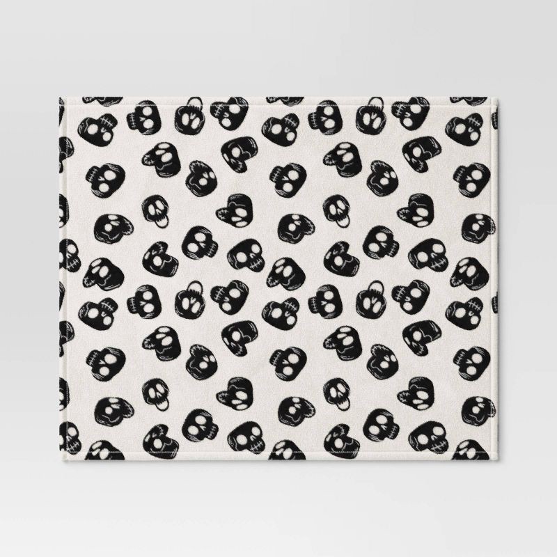 slide 3 of 5, Skulls Plush Throw Blanket - Hyde and EEK! Boutique™, 1 ct