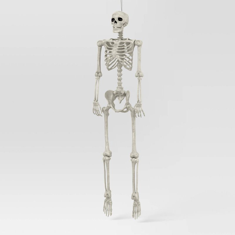 slide 1 of 3, 60" Poseable Bone Skeleton Halloween Decorative Prop Off-White - Hyde and EEK! Boutique™, 1 ct