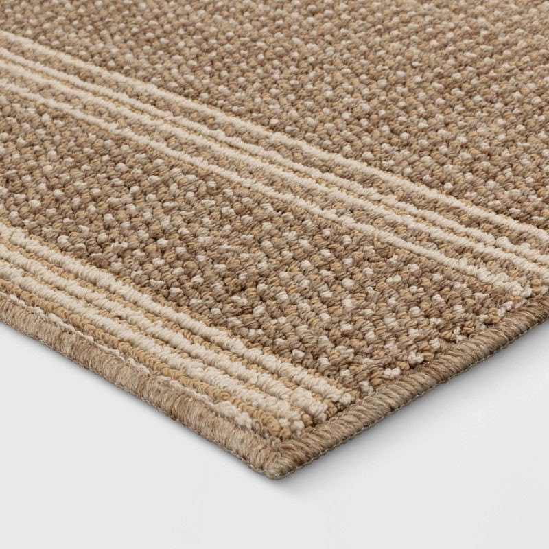 slide 3 of 4, 2'x3' Washable Tufted Accent Rug Light Brown - Threshold™, 1 ct