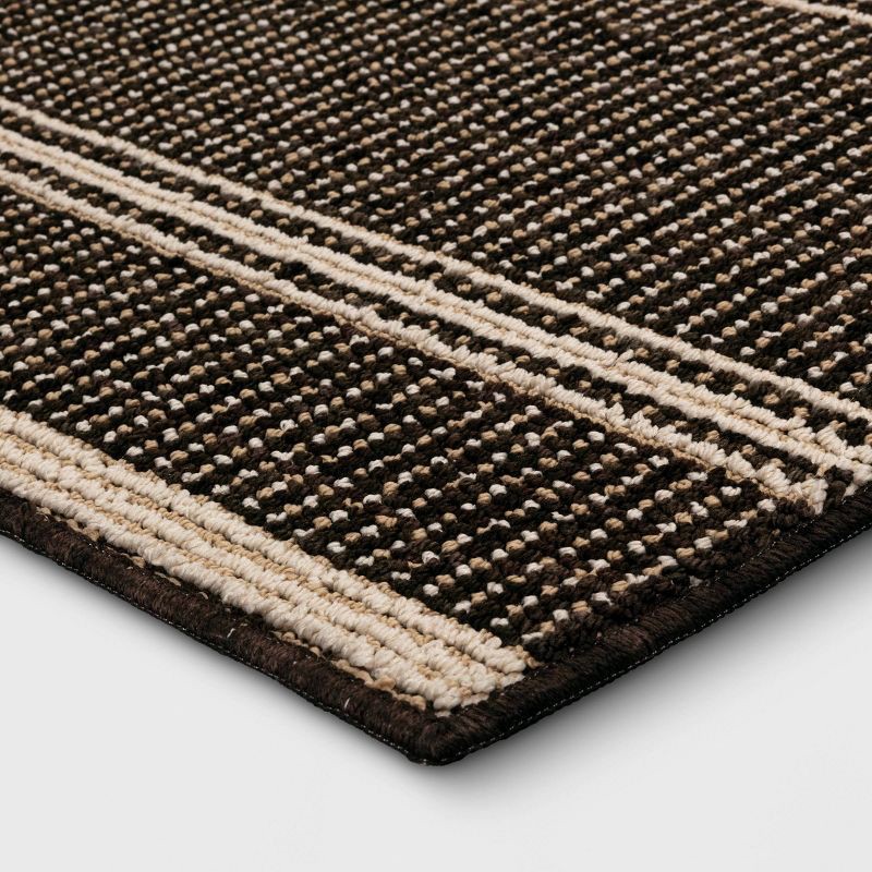 slide 3 of 4, 2'x3' Washable Tufted Accent Rug Dark Brown - Threshold™, 1 ct