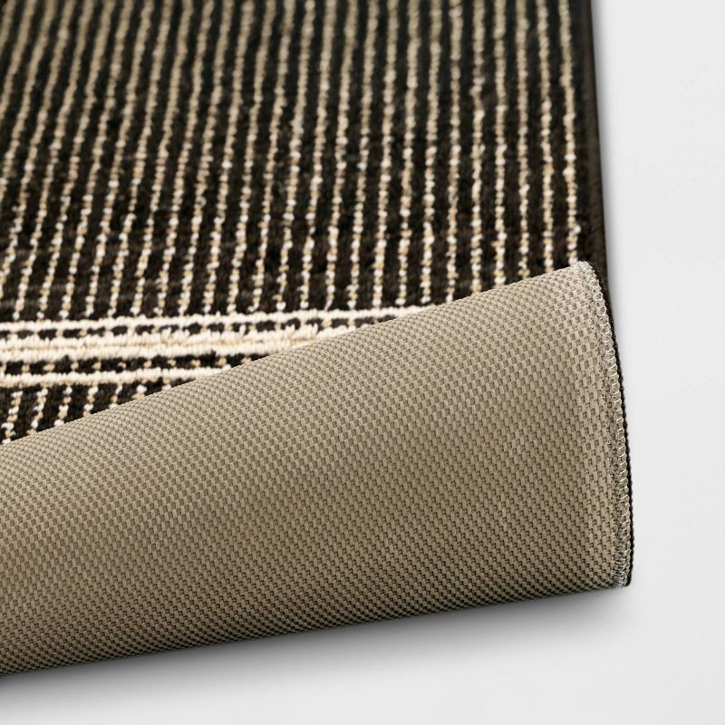 slide 4 of 4, 2'x3' Washable Tufted Accent Rug Dark Brown - Threshold™, 1 ct