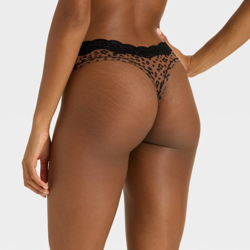 slide 2 of 5, Women's Luxe Stretch Thong Underwear with Lace Waistband - Auden™ Leopard Print XS, 1 ct