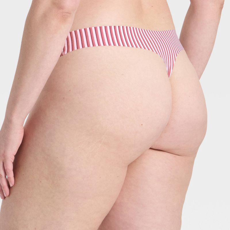 slide 5 of 5, Women's Invisible Edge Thong Underwear - Auden™ Berry Red S, 1 ct