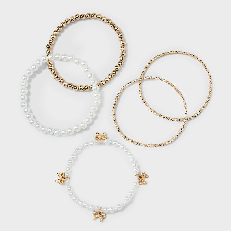 slide 3 of 4, Beaded and Pearl Bow Charm Bracelet Set 5pc - Wild Fable™ Gold, 5 ct