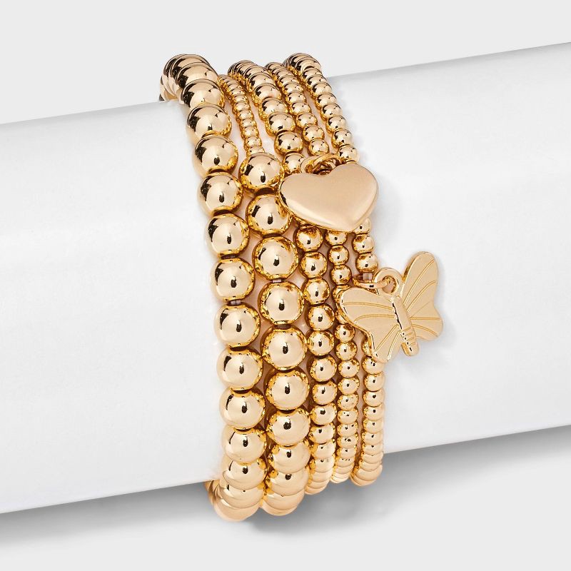 slide 2 of 4, Butterfly and Heart Charm Stretch Bracelet Set 5pc - Wild Fable™ Gold, 5 ct