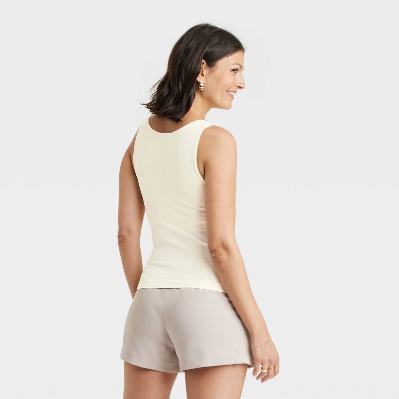 slide 2 of 4, Women's Slim Fit Seamless Tank Top - A New Day™ Off-White XS: Lightweight Sleeveless Scoopneck Pullover, 1 ct