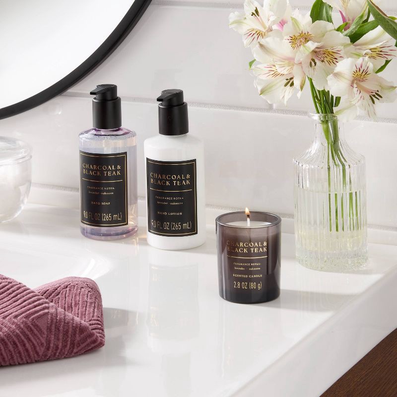 slide 2 of 3, 3pc Charcoal and Black Teak Personal Care Hand Soap and Lotion Candle Gift Set Light Purple - Threshold™, 3 ct