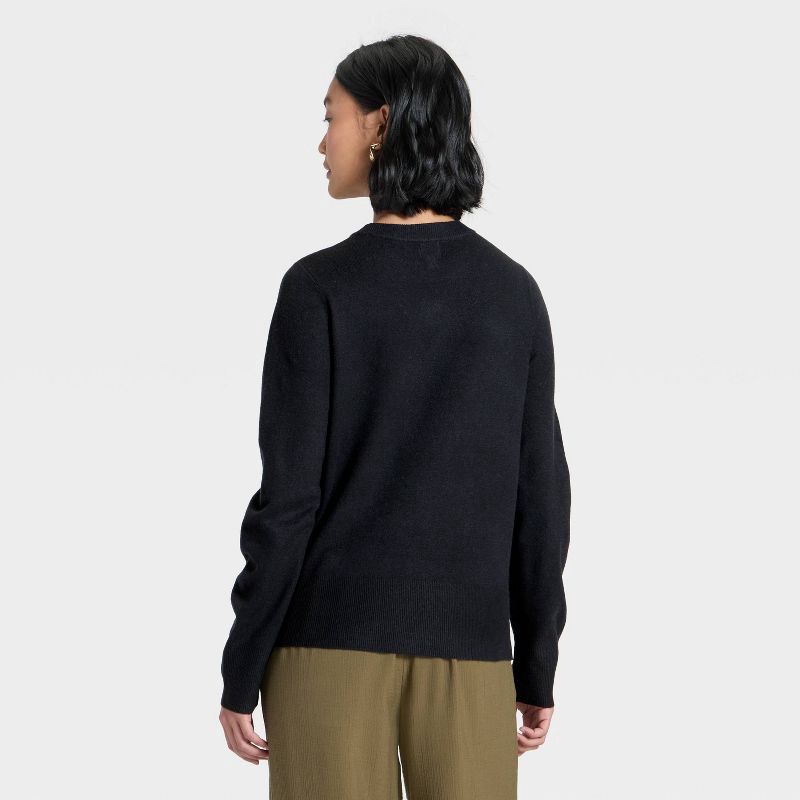 slide 2 of 3, Women's Slim Fit Cozy Knit Pullover Sweater - A New Day™ Black S, 1 ct