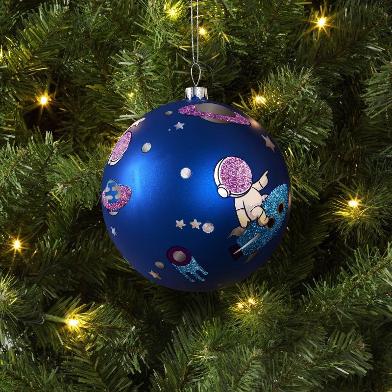 slide 2 of 3, 100mm Christmas Shatter-Resistant Ornament Space Blue with Astronaut - Wondershop™, 1 ct