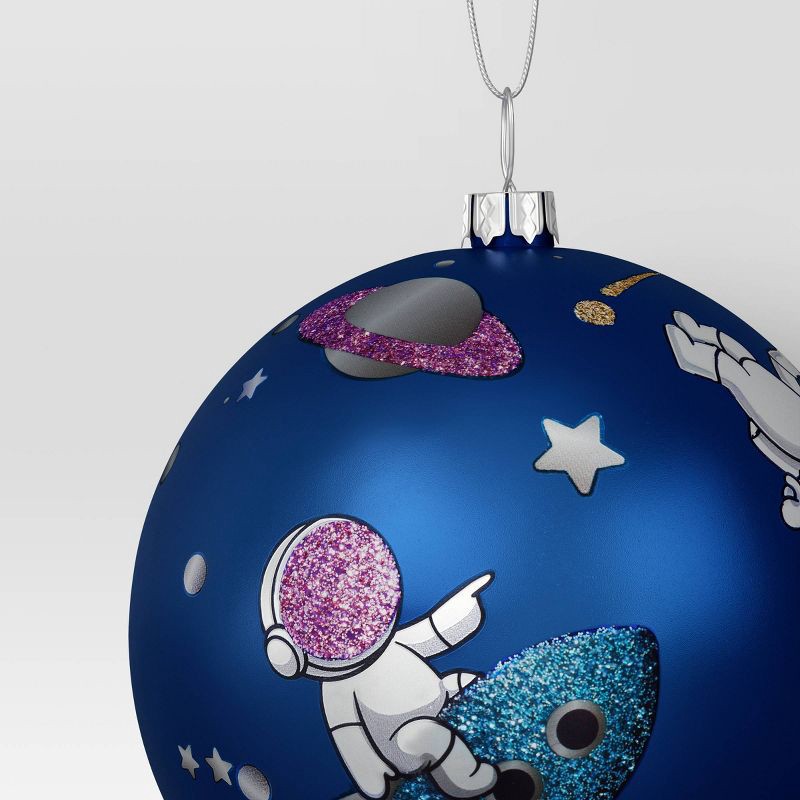 slide 3 of 3, 100mm Christmas Shatter-Resistant Ornament Space Blue with Astronaut - Wondershop™, 1 ct
