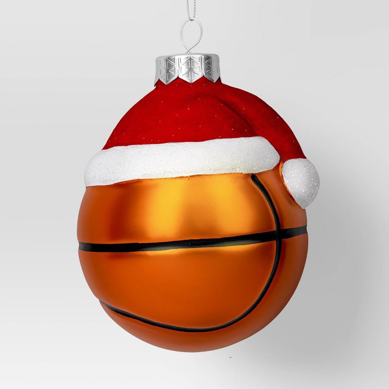 slide 1 of 3, 4" Christmas Glass Santa Hat Basketball Ornament - Wondershop™, 1 ct