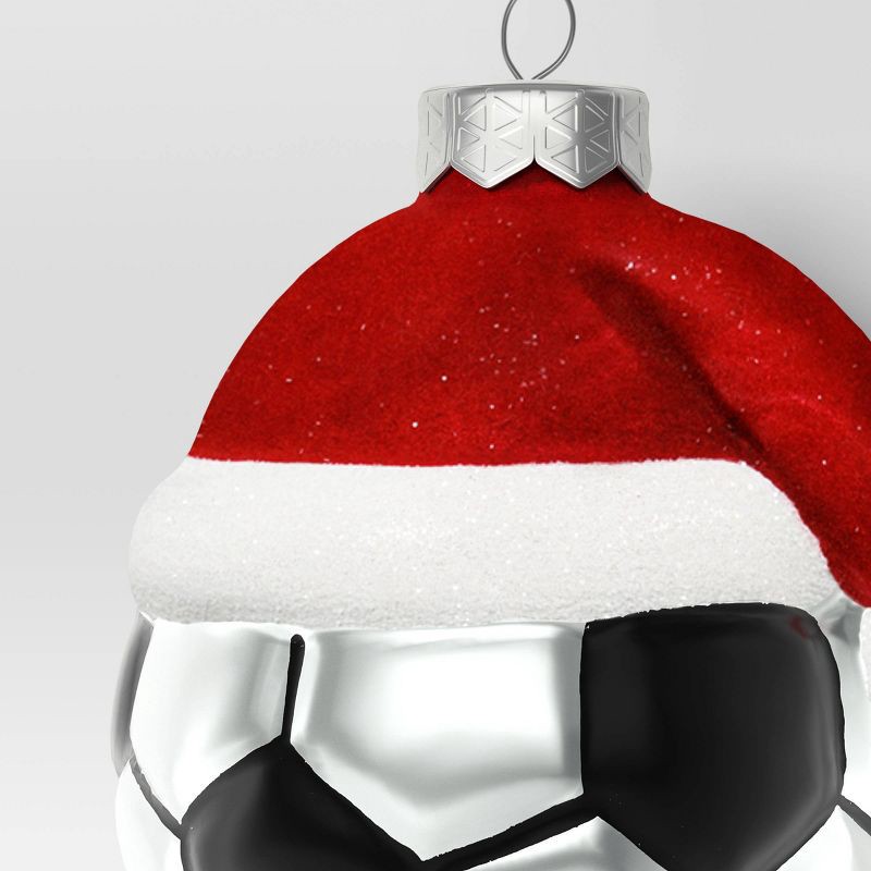 slide 3 of 3, 4" Christmas Glass Santa Hat Soccer Ball Ornament - Wondershop™, 1 ct