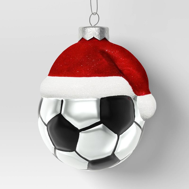 slide 1 of 3, 4" Christmas Glass Santa Hat Soccer Ball Ornament - Wondershop™, 1 ct