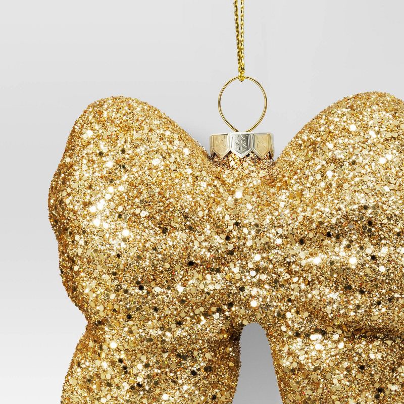 slide 3 of 3, Christmas Glass Shiny Champagne Bow Ornament - Wondershop™, 1 ct