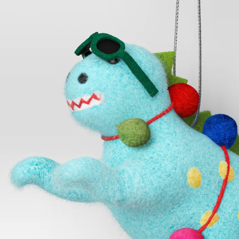 slide 3 of 3, Christmas Felted Wool Dino on Skates Ornament - Wondershop™, 1 ct