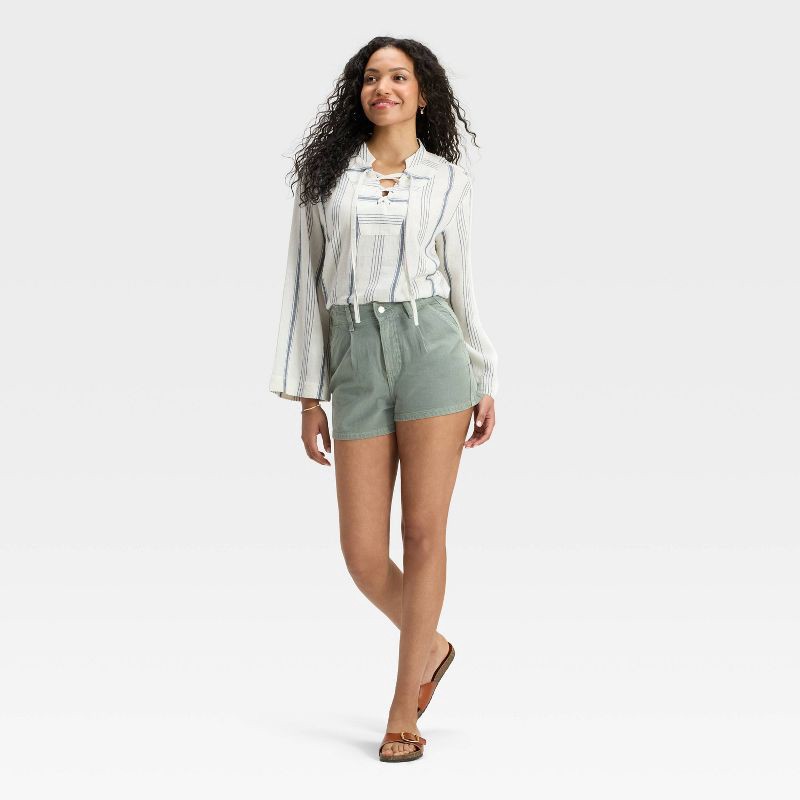 slide 3 of 5, Women's High-Rise Pleated Jean Shorts - Universal Thread™ Light Green 14, 1 ct