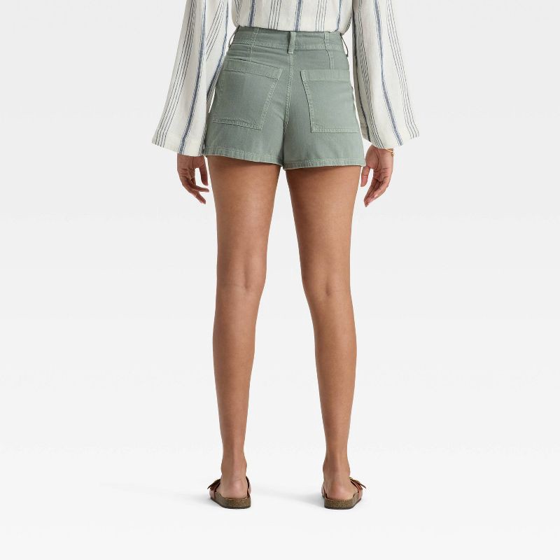 slide 2 of 5, Women's High-Rise Pleated Jean Shorts - Universal Thread™ Light Green 16, 1 ct