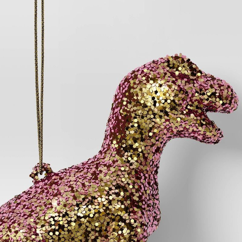 slide 3 of 3, 5" Christmas Plastic Chunky Glitter Pink Dinosaur Ornament - Wondershop™, 1 ct