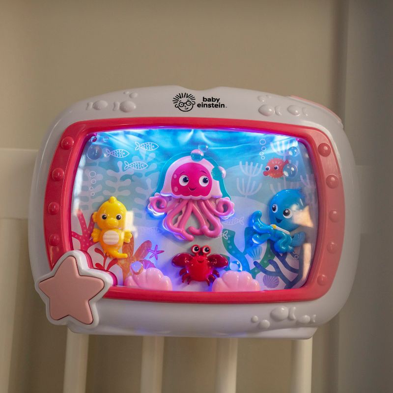 slide 2 of 7, Baby Einstein Sea Dreams Soother Musical Crib Toy and Sound Machine - Pink, 1 ct