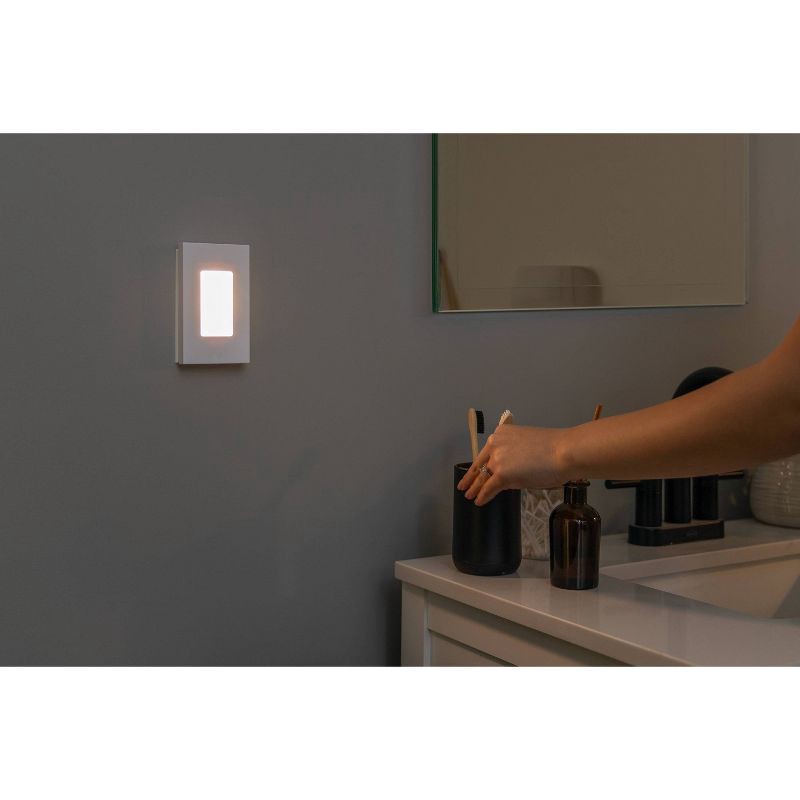 slide 6 of 8, Energizer 2pk Slimline Coverlite Light Sensing LED Nightlights White, 2 ct