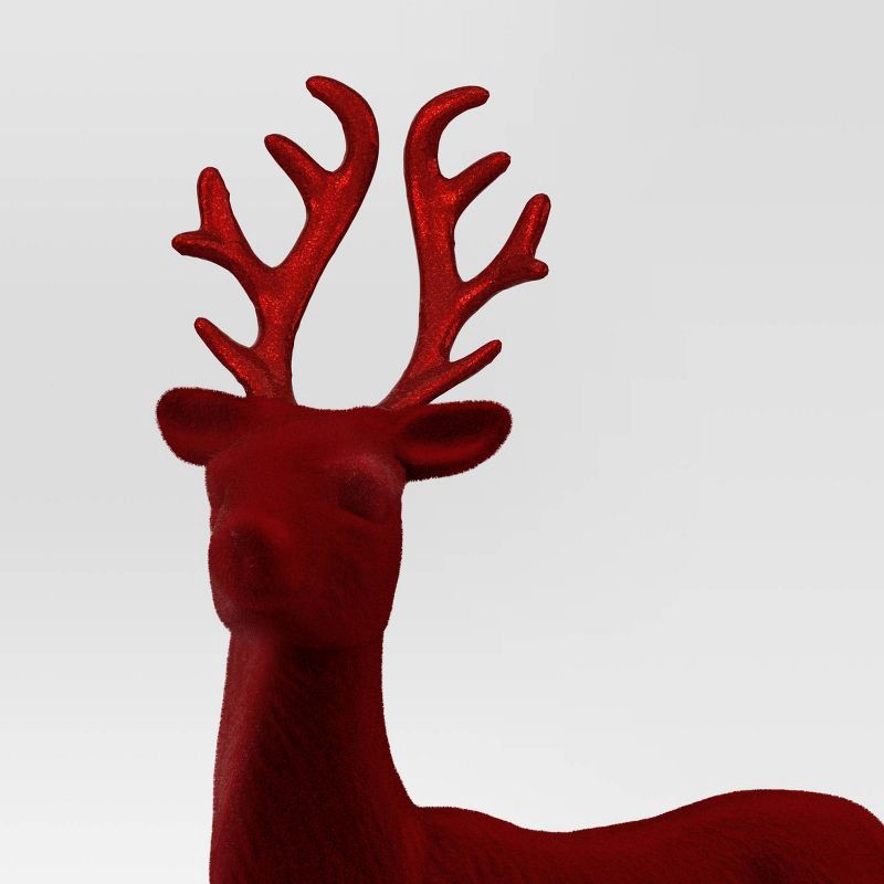 slide 3 of 3, 12" Christmas Flocked Standing Deer Decor Red - Wondershop™, 1 ct