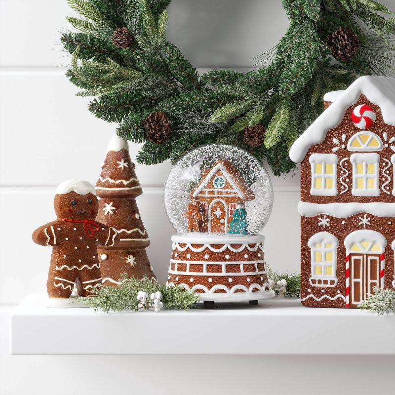 slide 2 of 3, Christmas Gingerbread House Snowglobe - Wondershop™, 1 ct