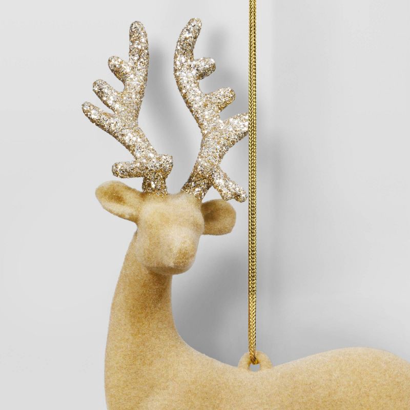 slide 3 of 3, 5.9" Christmas Plastic Light Brown Flocked Deer with Glitter Antler Ornaments - Wondershop™, 1 ct