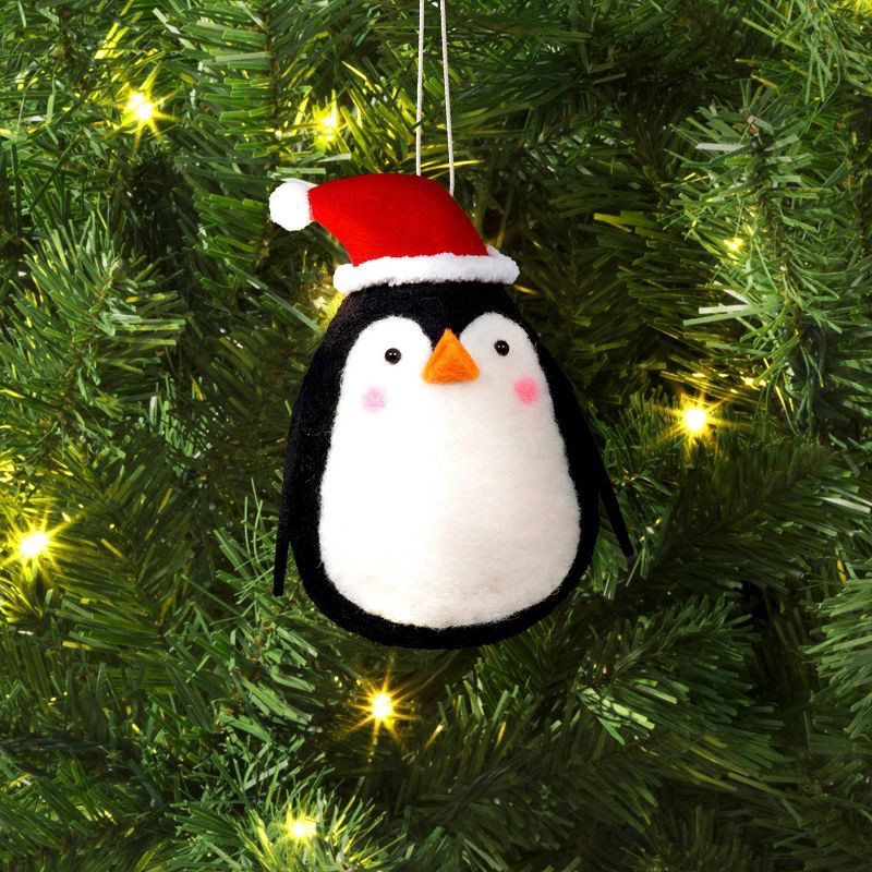 slide 2 of 3, Christmas Felted Wool Penguin Ornament with Santa Hat - Wondershop™, 1 ct