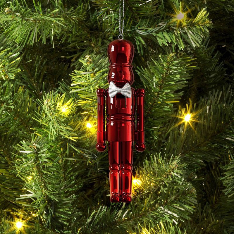 slide 2 of 3, Christmas Plastic Nutcracker Ornament Red - Wondershop™, 1 ct