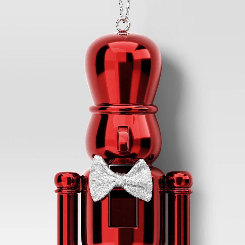 slide 3 of 3, Christmas Plastic Nutcracker Ornament Red - Wondershop™, 1 ct