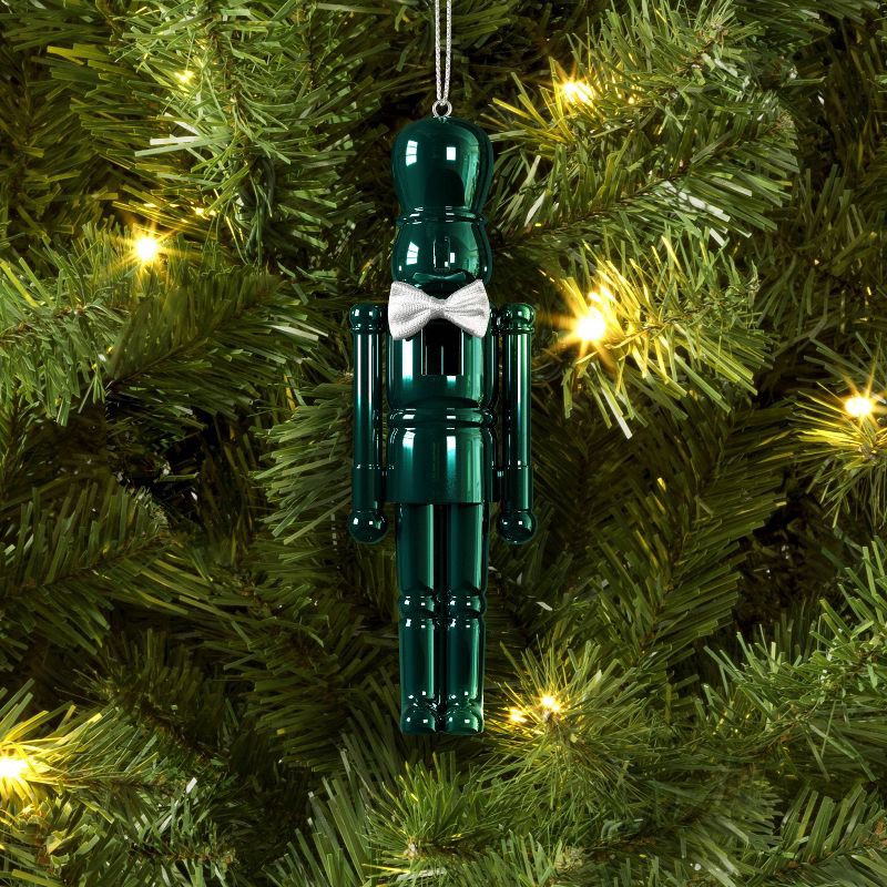 slide 2 of 3, Christmas Plastic Nutcracker Ornament Dark Green - Wondershop™, 1 ct