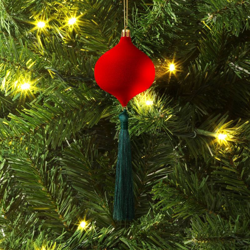slide 2 of 3, Christmas Onion Shaped Flocked Dark Red Ornament with Green Tassle - Wondershop™, 1 ct